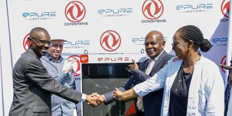 IMAGE 199JPG From left: Matatu Owners Association President Albert Karagacha, KCB Unit Head, Asset Finance and Insurance, Juliana Kinyua, and ePureMotion CEO Gilbert Saggia demonstrate the EV charging system during the official launch of an EV charging site for Matatu Owners Association vehicles in Buruburu, Nairobi, on July 14, 2026.