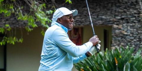 Kenya Airways Director of Flight Operations, Captain Paul Njoroge (Left), awards golfer Dennis Chebitwey the title of overall winner of the Iseme Kamau and Maema Advocates (IKM) and Oxygène Golf Tournament during the prize-giving Ceremony at the Windsor Golf Hotel and Country Club on July 10, 2026.
