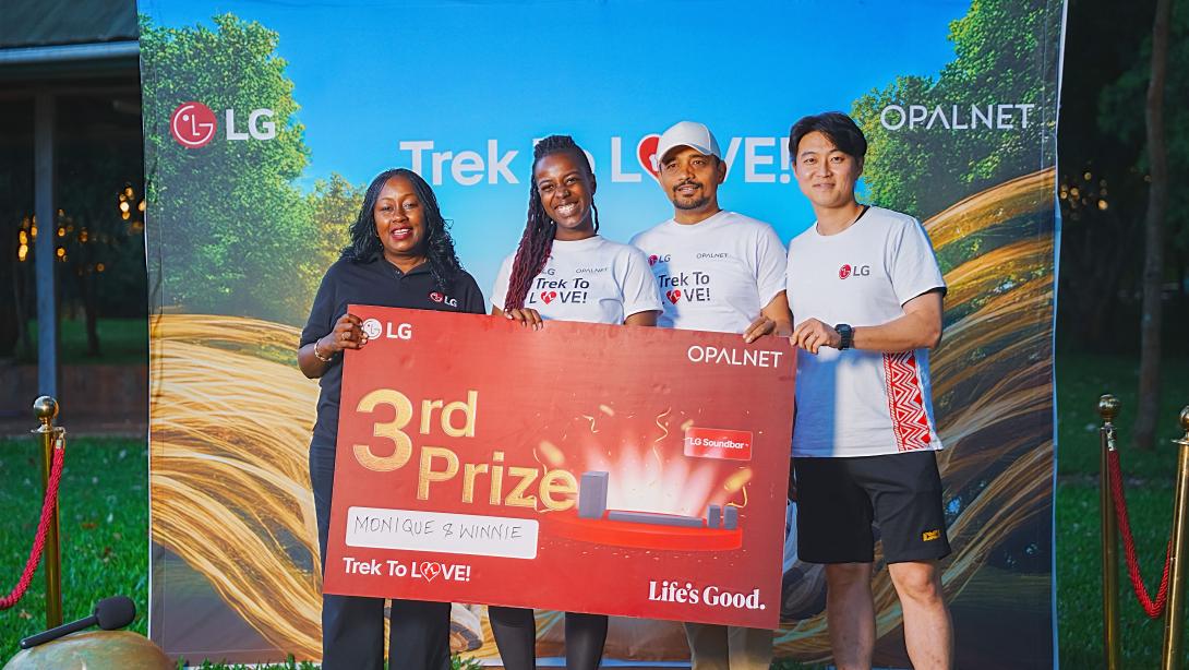 (L-R) LG Electronics East Africa Head of Marketing, Jane Kariuki, is joined by Opalnet Business Development Manager, Brijesh Kumar, and LG electronics East Africa, Media Solutions Product Manager, Seongsu Kim as they award the winners of the #TrekToLove challenge, Mohammed Omar and Serreti Nannes with an LG Bottom Freezer Refrigerator during the grand finale at Karura Forest. The duo clinched the top prize after outperforming other participants in a high-energy obstacle course designed to test strength, tru