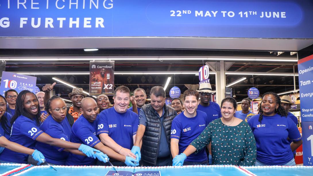 From left: Christophe Orcet, Regional Director – East Africa, Majid Al Futtaim Retail; Sanjey Shah, Director, Village Market Mall; Alexandre Cerqueira, District Manager – Supermarkets, Carrefour Kenya; and Ashni Shah, Director, Village Market Mall, together with Carrefour colleagues, during the celebration of the retailer’s 10-year milestone at Village Market. Since entering the market in 2016, the retailer has expanded to 34 stores nationwide, strengthened its e-commerce offering, and built one of the coun