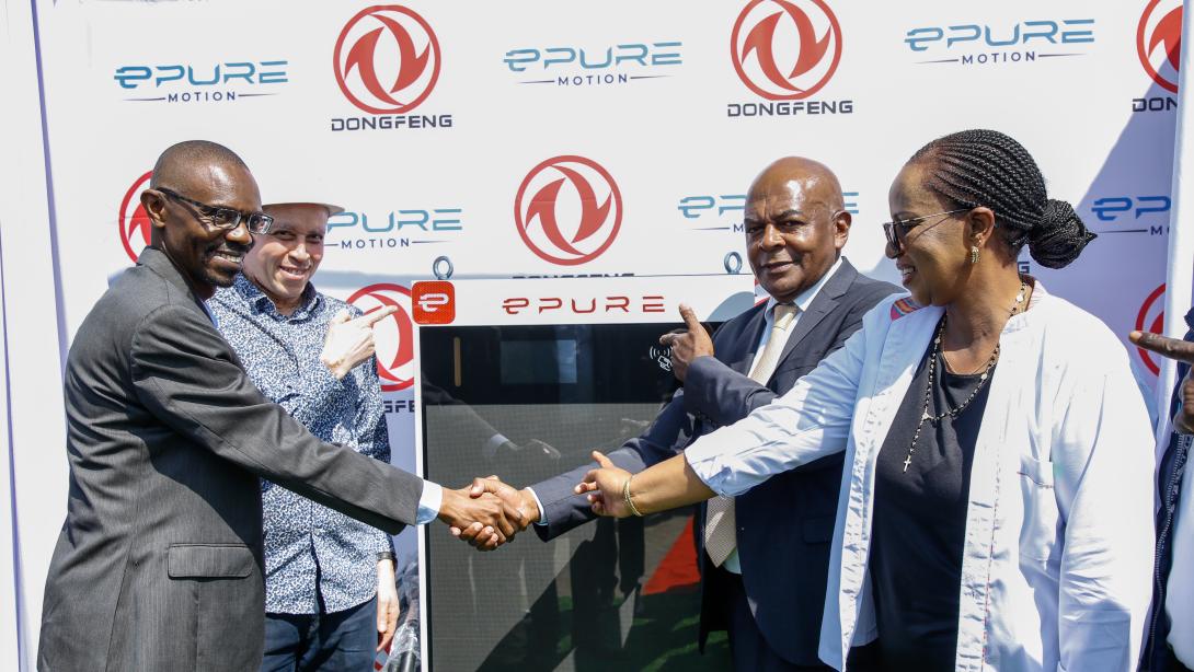 IMAGE 199JPG From left: Matatu Owners Association President Albert Karagacha, KCB Unit Head, Asset Finance and Insurance, Juliana Kinyua, and ePureMotion CEO Gilbert Saggia demonstrate the EV charging system during the official launch of an EV charging site for Matatu Owners Association vehicles in Buruburu, Nairobi, on July 14, 2026.