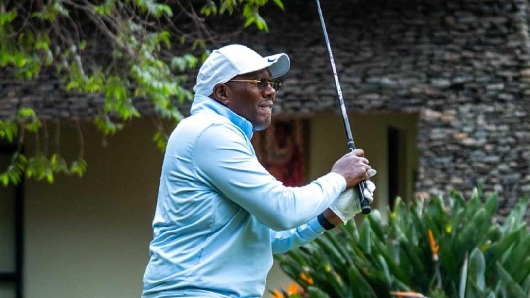 Kenya Airways Director of Flight Operations, Captain Paul Njoroge (Left), awards golfer Dennis Chebitwey the title of overall winner of the Iseme Kamau and Maema Advocates (IKM) and Oxygène Golf Tournament during the prize-giving Ceremony at the Windsor Golf Hotel and Country Club on July 10, 2026.