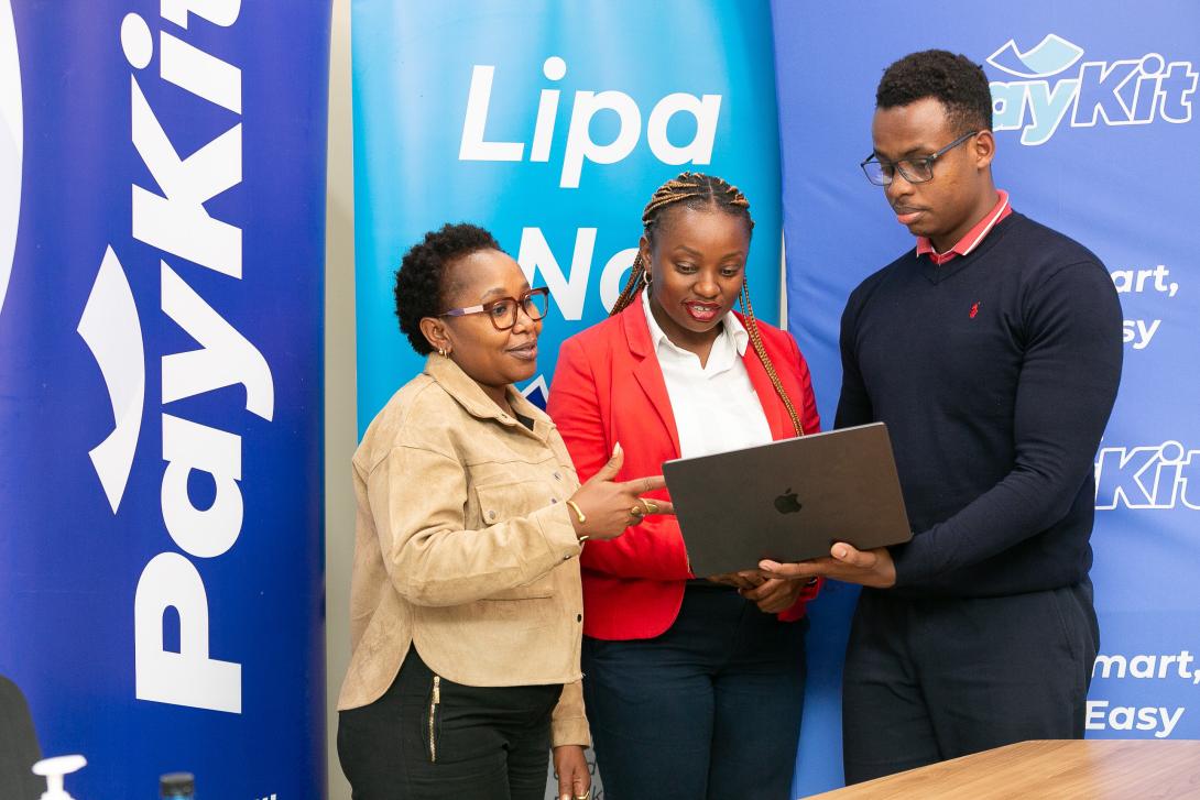 PayKit Kenya Marketing Manager Fridah Mutua, CEO Ms. Beatrice Okeyo and Michael Ooga from the company’s tech team during the launch of PayKit in Kenya. The Payments Services Provider’s products support individuals and MSMEs in managing complex, high-volume transactions more efficiently by serving as a scalable payments infrastructure. PayKit aims to process 50–60 million transactions, onboard 15,000 merchants and achieve 500,000 mobile app downloads by year-end as it plans to expand across local and regiona