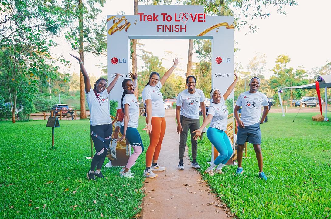LG Electronics East Africa Head of Marketing, Jane Kariuki, is joined by Opalnet Business Development Manager, Brijesh Kumar, and LG electronics East Africa, Media Solutions Product Manager, Seongsu Kim as they award the winners of the #TrekToLove challenge, Mohammed Omar and Serreti Nannes with an LG Bottom Freezer Refrigerator during the grand finale at Karura Forest. The duo clinched the top prize after outperforming other participants in a high-energy obstacle course designed to test strength, trust and