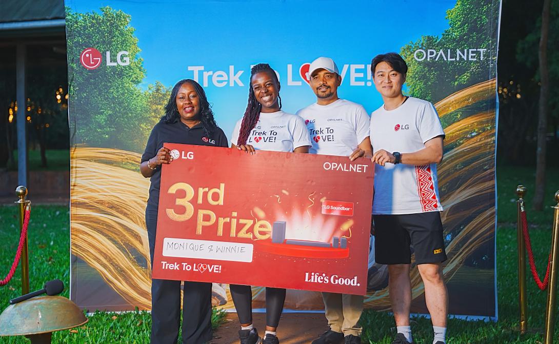 (L-R) LG Electronics East Africa Head of Marketing, Jane Kariuki, is joined by Opalnet Business Development Manager, Brijesh Kumar, and LG electronics East Africa, Media Solutions Product Manager, Seongsu Kim as they award the winners of the #TrekToLove challenge, Mohammed Omar and Serreti Nannes with an LG Bottom Freezer Refrigerator during the grand finale at Karura Forest. The duo clinched the top prize after outperforming other participants in a high-energy obstacle course designed to test strength, tru
