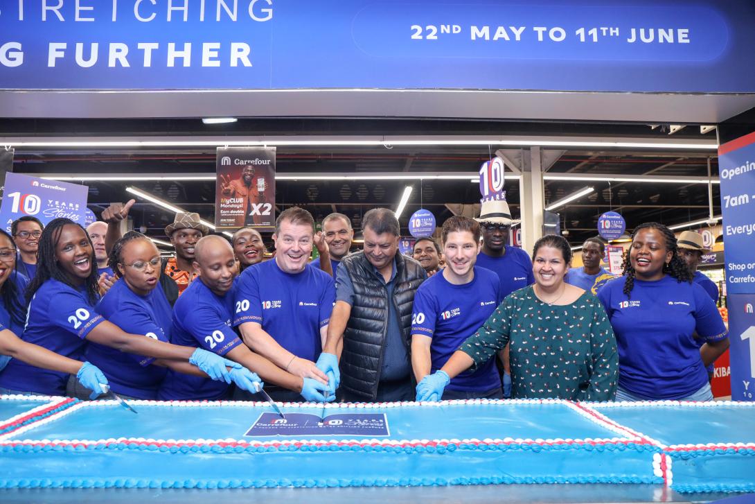 From left: Christophe Orcet, Regional Director – East Africa, Majid Al Futtaim Retail; Sanjey Shah, Director, Village Market Mall; Alexandre Cerqueira, District Manager – Supermarkets, Carrefour Kenya; and Ashni Shah, Director, Village Market Mall, together with Carrefour colleagues, during the celebration of the retailer’s 10-year milestone at Village Market. Since entering the market in 2016, the retailer has expanded to 34 stores nationwide, strengthened its e-commerce offering, and built one of the coun