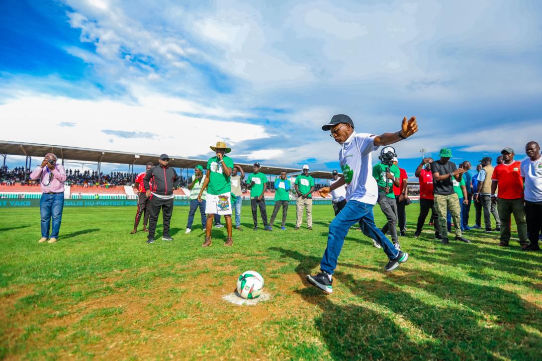 Safaricom CEO Peter Ndegwa takes a penalty kick to officially launch Season Five of the Safaricom Chapa Dimba tournament at Jomo Kenyatta Stadium, Mamboleo, in Kisumu.