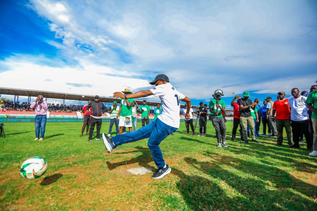 Safaricom CEO Peter Ndegwa takes a penalty kick to officially launch Season Five of the Safaricom Chapa Dimba tournament at Jomo Kenyatta Stadium, Mamboleo, in Kisumu.