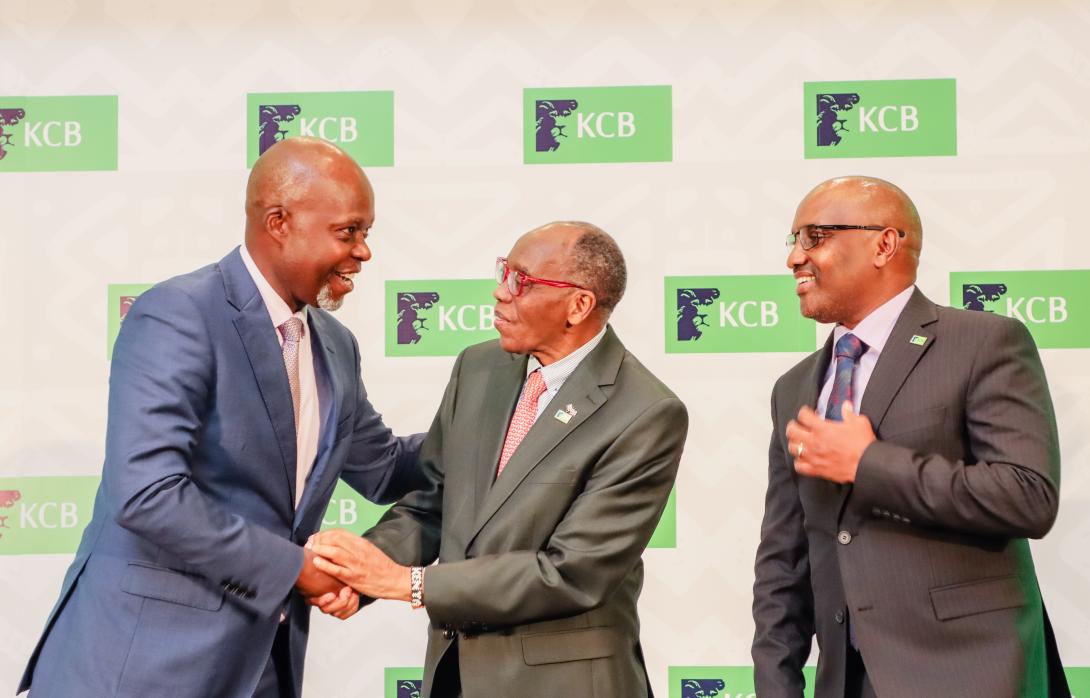 From Left: KCB Group Finance Director, Lawrence Kimathi, Group Chairman, Dr. Joseph Kinyua and Group CEO, Paul Russo share a light moment during a past event.