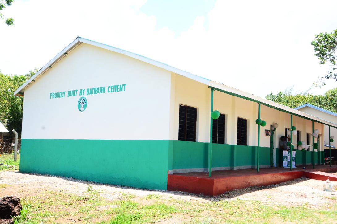 A classroom block built by Bamburi Cement at Bureni school in Vipingo is decorated with green and white balloons for the handover.