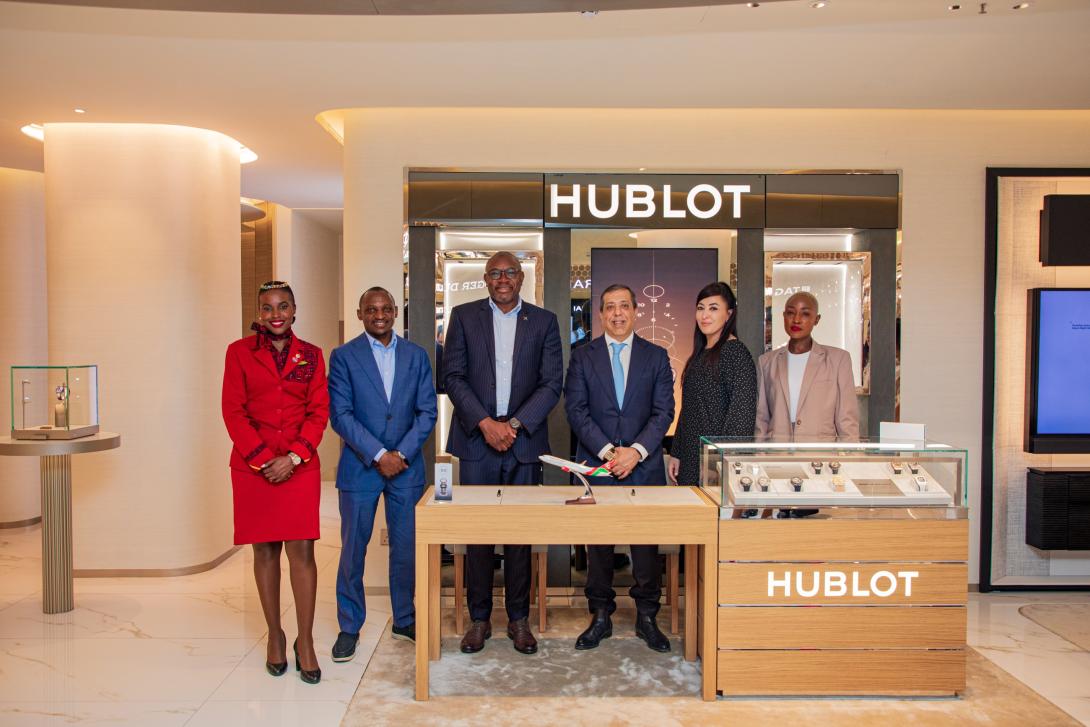 At the center, Habil Waswani, Acting Group Managing Director and CEO of Kenya Airways and Mahesh Shahani, CEO of Art of Luxury during the partnership signing ceremony at the recently opened Art of Luxury shop at GTC Mall.